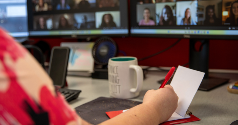 UL Lafayette online student studies at computer using proctoring services.