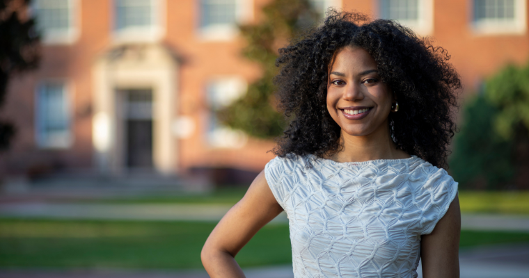 Kyla Granger smiles for a portrait in UL Lafayette's quad.