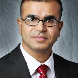 Portrait photograph of Islam Aminul