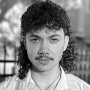 Portrait photograph of Liam Gardner
