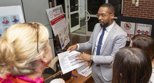 A recent FLC participant presents on their community's findings during the FLC showcase.