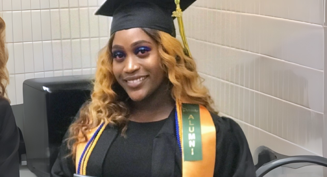 RN to BSN online graduate Tasmin George smiles for photo after earning her ADN.