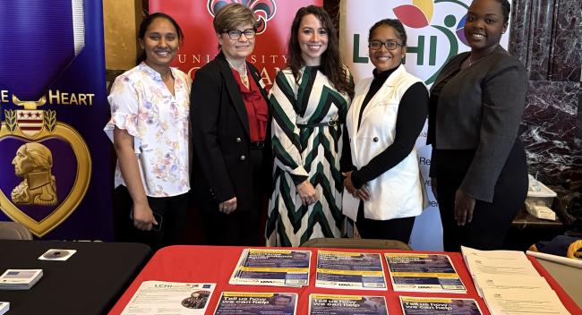 LCHI team at display table