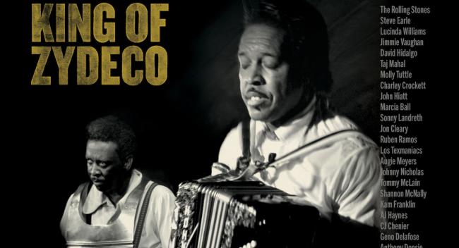 A cover of the album "A Tribute to the King of Zydeco" featuring a black-and-white image of Clifton Chenier playing accordion.
