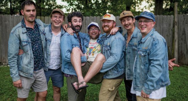 Members of the Gravy Boys pose for a photo in their signature denim jackets.