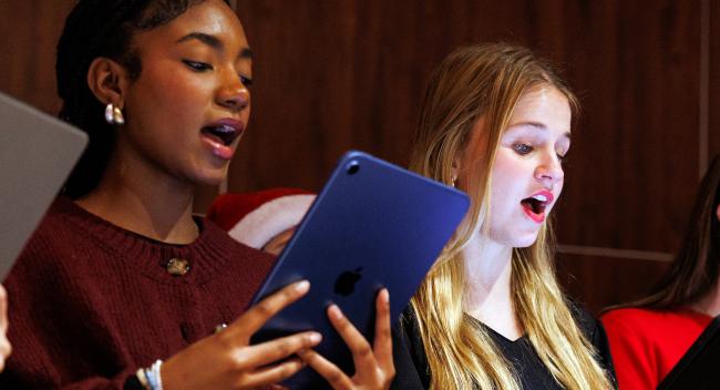 Members of the chamber singers during a campus holiday event