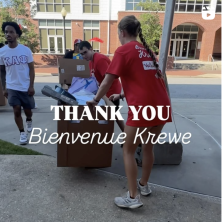 People moving their things in a giant cardboard box overlaid with the text "Thank you bienvenue Krewe"