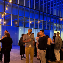 A group of people at a party in the Hilliard Art Musuem