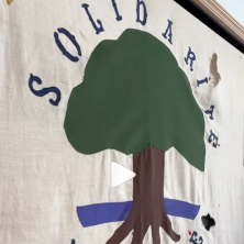 A piece of artwork showcasing solidarity towards Acadiana and Creole culture through a tree logo