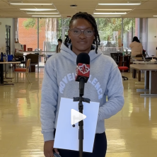 UL student stand infront of UL microphone and answers the question, "What keep you grounded?"