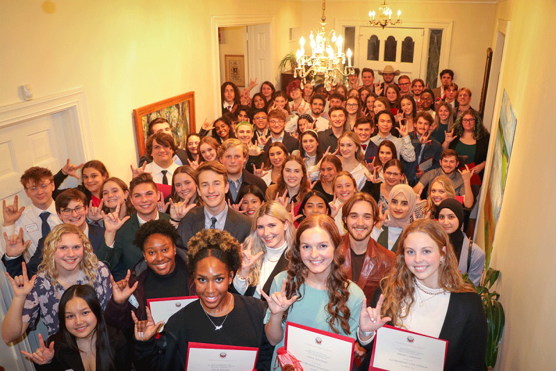 2022 Top Scholars gather at the President's House for a reception