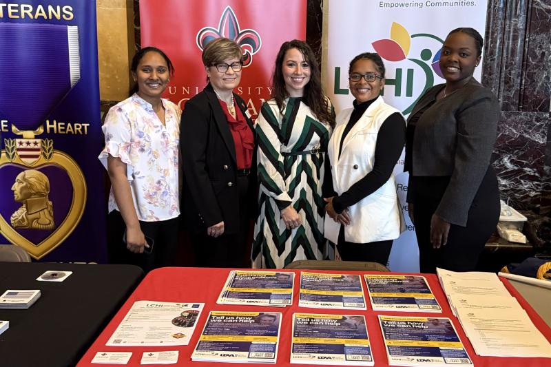 LCHI team at display table