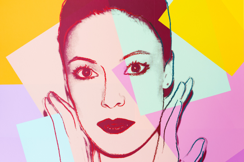 A pop art portrait by Andy Warhol featuring a woman's face.