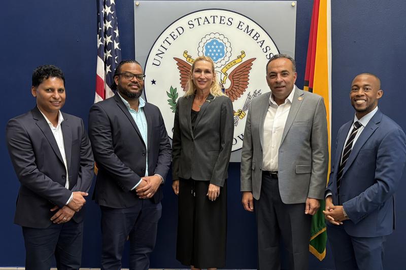 Researchers with ambassador