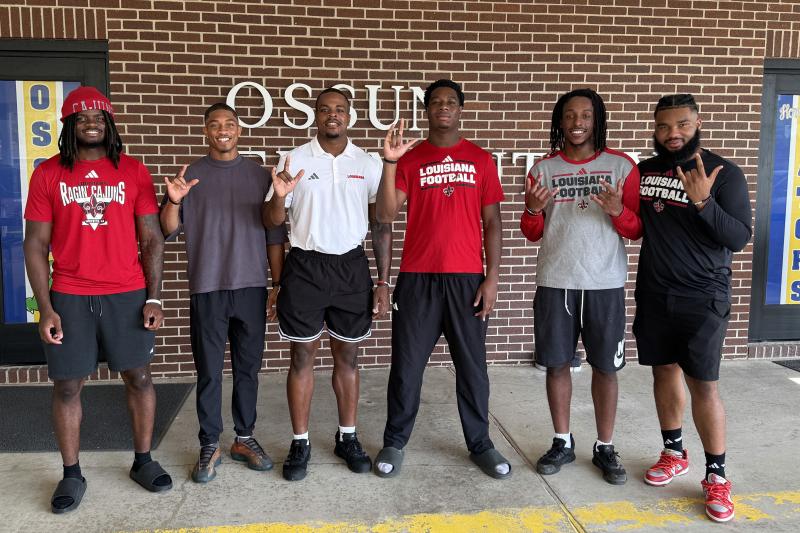 Football players at Ossun Elementary