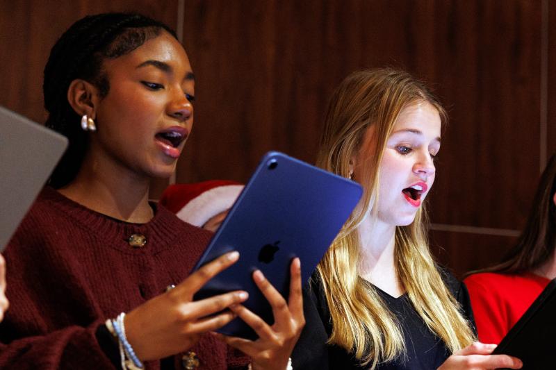 Members of the chamber singers during a campus holiday event