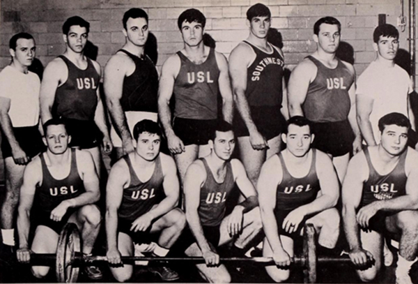 Members of the USL (now UL Lafayette) weightlifting team in 1965, the year the squad began its streak of five consecutive national title wins, included, kneeling, Mike Williams, Jimmy Reinhardt, Dickie Fleming, Weldon Major and Alvin Chustz. Standing were Ken Morris, Ed Ortego, Joe Murry, George Weatherford, Charles Jenkins, Pat Stewart and Jay Trahan. Photo from the 1966 L'Acadien yearbook.