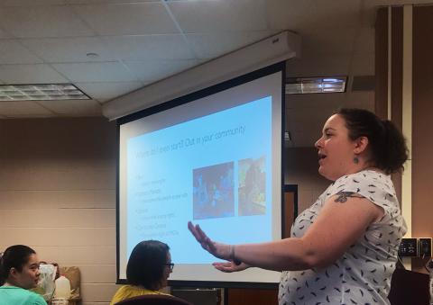 Biologist Sarah McAnulty giving a presentation to the UL Lafayette Graduate School about communicating research.