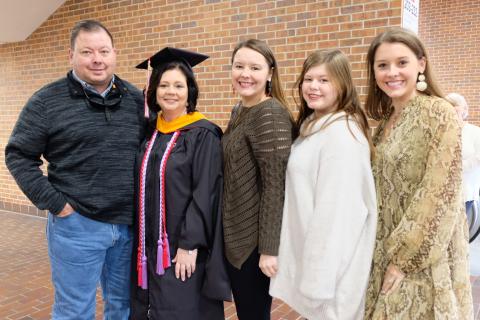 Tina Billberry, Outstanding Master's Graduate, with her family.