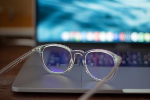 Image of glasses on a laptop.
