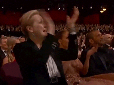 Gif of Meryl Streep and Jennifer Lopez cheering and clapping